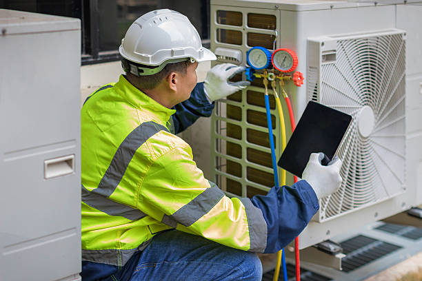 Professional Hvac technician working in Pine Level, NC